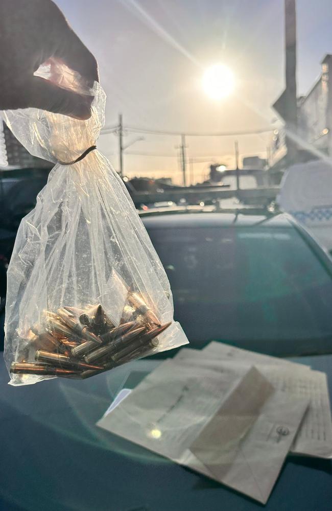 During a search of the car, officers located a box containing 48 live rounds of ammunition in the trunk.