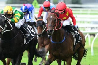 Winona Costin steering Philipsburg (right) to victory in a race at Doomben in April. Picture: Trackside Photography