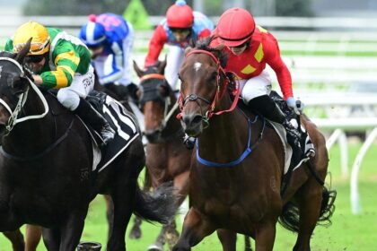 Winona Costin steering Philipsburg (right) to victory in a race at Doomben in April. Picture: Trackside Photography