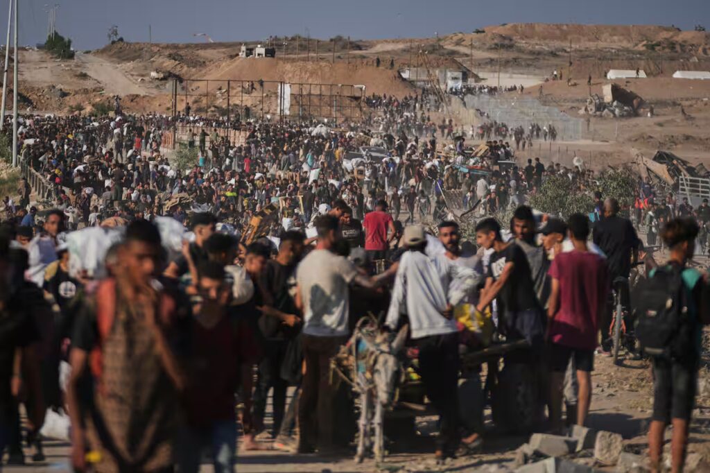 Medics say those killed in a strike that hit a water distribution point included a 12-year-old. Source: AP / Abdel Kareem Hana